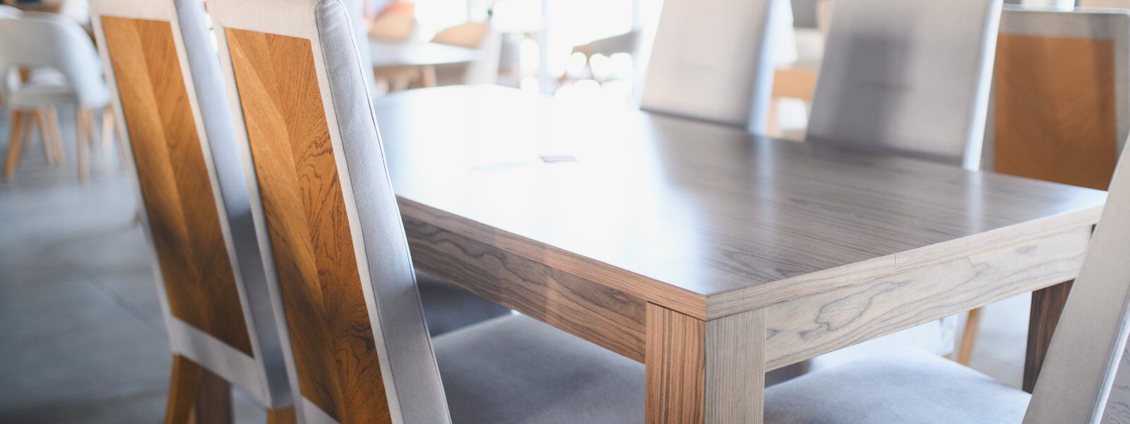 modern dining table and chairs in furniture showro 2026 03 05 11 37 24 utc1