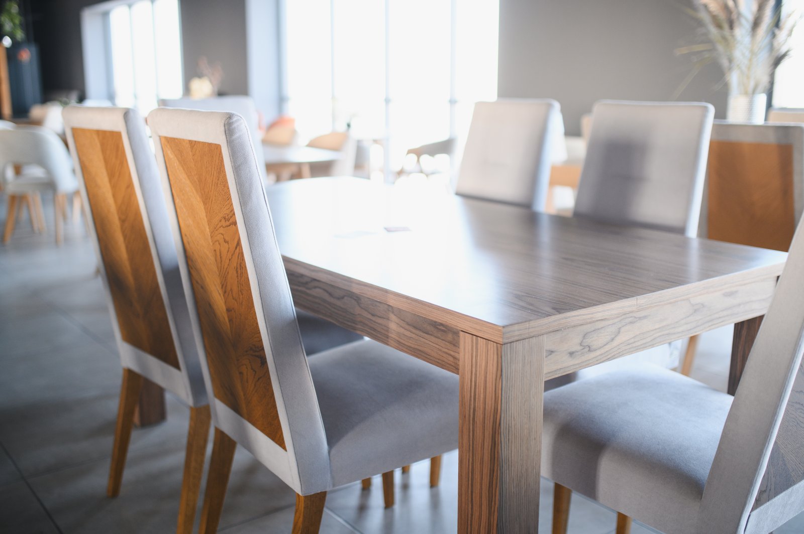 modern dining table and chairs in furniture showro 2026 03 05 11 37 24 utc1